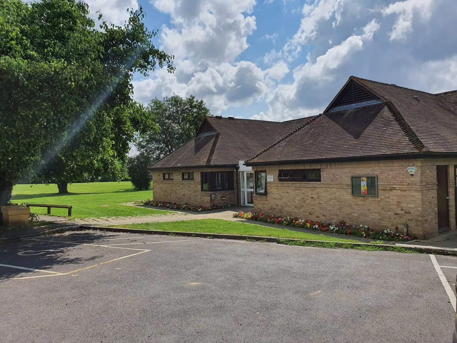 Burwell Hall, a single-storey brick hall with its own car park in Witney